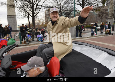 Peach Bowl President and CEO Gary Stokan waves during the Chick-fil-A Peach Bowl Parade before the Chick-fil-A Peach Bowl NCAA semifinal playoff game at the Georgia Dome in Atlanta, December 31, 2016. Photo by David Tulis/UPI Stock Photo