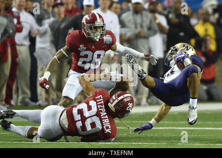 Alabama defensive back Shyheim Carter (5) stops Texas A&M running