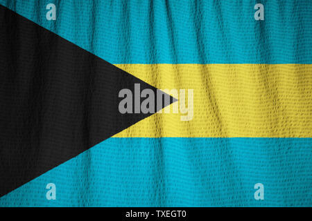 Ruffled Flag of Bahamas Blowing in Wind Stock Photo