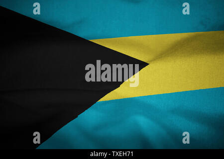 Ruffled Flag of Bahamas Blowing in Wind Stock Photo