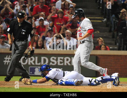 St. Louis Cardinals Lance Berkman embraces Albert Pujols after the