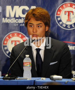 New Texas Rangers pitcher Yu Darvish talks to the media during a press conference at The Ballpark in Arlington on January 20, 2012 in Arlington, Texas.  Darvish signed a contract worth $60 million over six years.   The two-time MVP of Japan's Pacific League had a 93-38 record with a 1.99 ERA in 167 games the past seven seasons. The 25-year-old right-hander was a five-time All-Star in Japan.   UPI/Ian Halperin Stock Photo