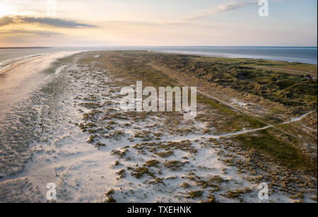 Drones View over the sand dunes and the sandy beach of the island Juist in the North Sea in summer. Stock Photo