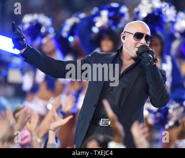 Rapper Pittbull performs during halftime of the Dallas Cowboys and