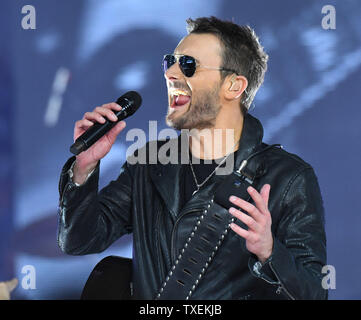 Country music star Eric Church performs during halftime of the Dallas  Cowboys and Washington Redskins game at AT&T Stadium on November 24, 2016  in Arlington, Texas. The performance kicked off The Salvation