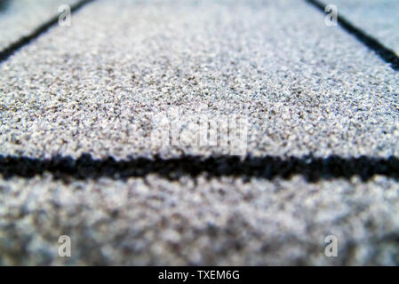 Perspective of grey carpet with black lines background texture, close up, gray textile texture, fluffy rug background, dark wool fabric texture, grey Stock Photo
