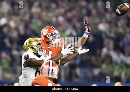 Clemson Tigers safety Isaiah Simmons (11) breaks up a pass intended for Notre Dame Fighting Irish wide receiver Miles Boykin (81) during the first half of the College Football Playoff Semifinal at the Goodyear Cotton Bowl Classic at AT&T Stadium in Arlington, Texas on December 29, 2018. Photo by Shane Roper/UPI Stock Photo