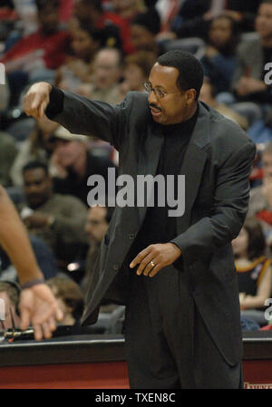 Atlanta Hawks coach Mike Woodson signals to his players during a game against the visiting Milwaukee Bucks January 20, 2006, in Atlanta's Philips Arena. The Bucks defeated the Hawks, 118-102. (UPI Photo/John Dickerson) Stock Photo
