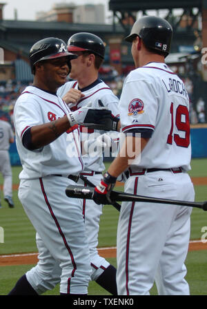 Atlanta Braves Andruw Jones (left) is congratulated by teammate Adam LaRoche (19) after Jones' two-run homer in the first inning against the Los Angeles Dodgers May 31, 2006, in Atlanta's Turner Field. The Braves defeated the Dodgers 9-3. (UPI Photo/John Dickerson) Stock Photo
