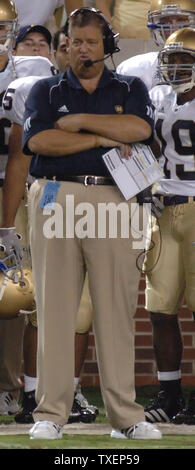 Notre Dame Charlie Weis watches his team during practice of an NCAA ...