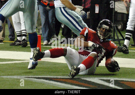 Atlanta Falcons running back Justin Griffith rushes in first half action  against the Miami Dolphins at Dolphin Stadium, this play ended in a fumble  which the Dolphinss recovered, in Miami Florida, on