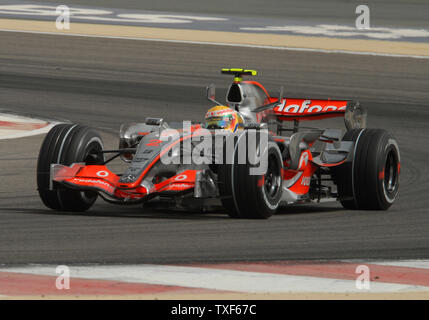 McLaren's Formula One driver Lewis Hamilton secures second position during time trials on the second day of practice in Bahrain on April 14, 2007. Ferrari's Felipe Massa won pole position and his team mate Kimi Raikkonen won third position. The Bahrain Formula One Grand Prix will be held on April 15 and will feature 11 teams and 22 drivers. (UPI Photo/Norbert Schiller) Stock Photo