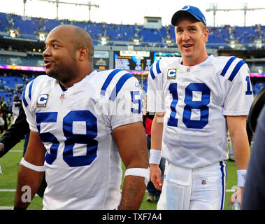 Indianapolis Colts quarterback Peyton Manning (18) walks off with linebacker Gary Brackett after the Colts defeated the Baltimore Ravens 17-15 at M&T Bank Stadium in Baltimore, Maryland on November 22, 2009.   UPI/Kevin Dietsch Stock Photo