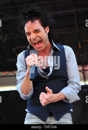 Patrick Monahan, the lead singer of Train, performs with his band in ...