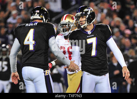Baltimore Ravens kicker Billy Cundiff (7) celebrates with holder Sam Kock after kicking a 39-yard field goal against the San Francisco 49ers during the first quarter at M&T Bank Stadium in Baltimore on November 24, 2011.  UPI/Kevin Dietsch Stock Photo