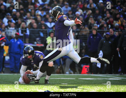 Baltimore Ravens kicker Billy Cundiff kicks a 36-yard field goal against the Indianapolis Colts in Baltimore, Maryland on December 11, 2011.  UPI/Kevin Dietsch Stock Photo