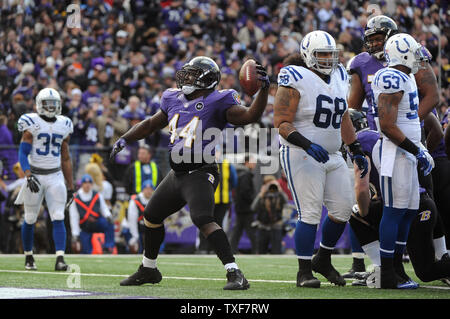 Baltimore Ravens Joe Flacco reacts with Vonta Leach after throwing a 3 yard  touchdown pass in the fourth quarter against the New England Patriots in  the AFC Championship Game at Gillette Stadium