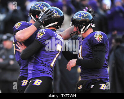 Baltimore Ravens kicker Billy Cundiff (7) is congratulated by teammates after kicking a 44-yard field goal during the fourth quarter at M&T Bank Stadium in Baltimore, Maryland on January 15, 2012.  UPI/Kevin Dietsch Stock Photo