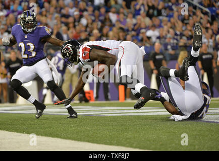 Atlanta Falcons wide receiver Julio Jones brings in an 8-yard touchdown reception against the Baltimore Ravens during the first quarter at M&T Bank Stadium on August 15, 2013 in Baltimore, Maryland.  UPI/Kevin Dietsch Stock Photo