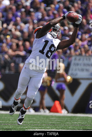 Cleveland Browns wide receiver Greg Little, left, is tackled by Miami  Dolphins cornerback Will Allen after a short gain in the fourth quarter at Cleveland  Browns Stadium in Cleveland, Ohio, Sunday, September