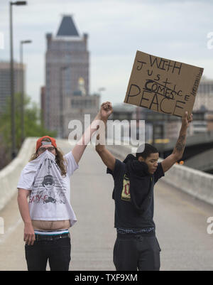 Protesters block an off ramp to rt 83 during the Black Lives Matter May Day Action Protest to show support for Freddie Gray and all arrested protesters, in Baltimore, Maryland, May 1, 2015. Baltimore City state's attorney Marilyn Mosby, announced earlier today that the death of Freddie Gray was a homicide and said the six arresting officers will be charged. Gray, 25, who was arrested on April 12, died a week later in the hospital from spinal cord injury he received while in police custody. Photo by Kevin Dietsch/UPI Stock Photo