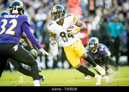 Pittsburgh Steelers Antonio Brown prepares to make a catch over  Jacksonville Jaguars A.J. Bouye for a touchdown in the second quarter of  the AFC Divisional round playoff game at Heinz Field in