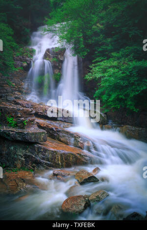 An accidental heavy rain formed a small waterfall on this stone slope of Mount Lushan. Stock Photo