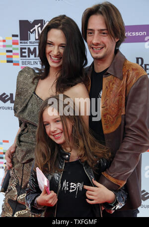 Asia Argento, husband Michele Civetta and their daughter arrive at the MTV Europe Music Awards in Berlin, Germany on November 5, 2009.   (UPI Photo/David Silpa) Stock Photo