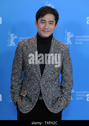 Tony Leung Chiu Wai arrives at the photo call for the film 'The Grandmaster' during the opening of the 63rd Berlinale Film Festival in Berlin on February 7, 2013.   UPI/David Silpa Stock Photo