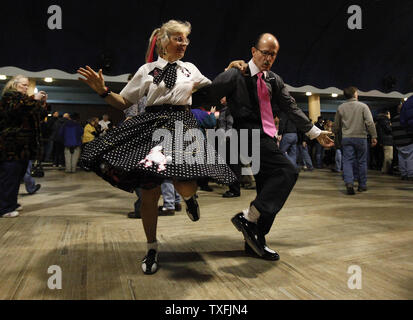 Jan (L) and Dan Hanson of Cedar Falls, Iowa dance before a tribute concert memorializing Buddy Holly, J.P. 'The Big Bopper' Richardson and Ritchie Valens at the Surf Ballroom in Clear Lake, Iowa on February 2, 2009. The three rock 'n' roll pioneers played their last show at the Surf Ballroom 50 years ago to the day. Singer Don McLean coined the phrase 'the day the music died' in his hit song 'American Pie' referring to the plane crash that killed the three stars in the early morning hours of February 3, 1959.  (UPI Photo/Brian Kersey) Stock Photo