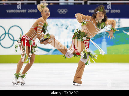 Oksana Domnina (L) and Maxim Shabalin of Russia skate during their