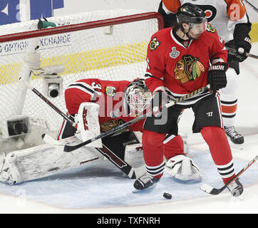 Chicago Blackhawks goalie Antti Niemi (L) looks to make a save as defenseman Brent Sopel defends during the third period of game 2 of the 2010 Stanley Cup Final against the Philadelphia Flyers at the United Center in Chicago on May 31, 2010. The Blackhawks won 2-1 and lead the best of seven series 2-0.     UPI/Brian Kersey Stock Photo