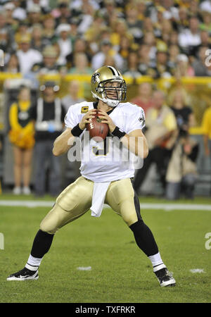 Brian Brohm of the Green Bay Packers passes during warmups at an NFL