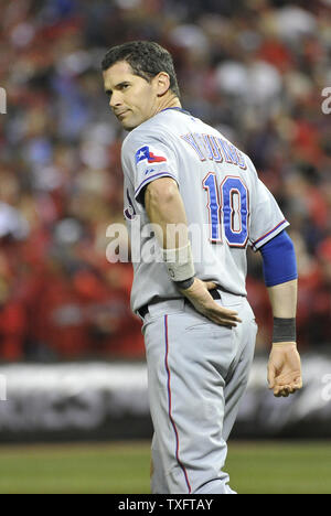 Texas Rangers' Michael Young (10) is tagged out at second base on a ...