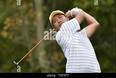 International Team member Hideki Matsuyama of Japan tees off on the ninth hole during the third round four-ball competition against the United States Team at the 2013 Presidents Cup at Muirfield Village Golf Club in Dublin, Ohio on October 5, 2013.     UPI/Brian Kersey Stock Photo