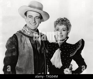 In Old Oklahoma Year : 1943 USA Director : Albert Rogell John Wayne, Martha Scott Republic Pictures Stock Photo