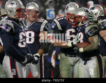 New England Patriots guard Stephen Neal (61) and offensive lineman John Wise  (71) during their afternoon training camp in Foxborough, Mass., Thursday,  July 29, 2010.(AP Photo/Charles Krupa Stock Photo - Alamy