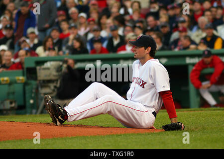 Boston Red Sox pitcher Matt Clement sits on the mound after being hit by New York Yankees  center fielder Bernie Williams in the second inning at Fenway Park in Boston on May 24, 2006. Clement remained in the game.  (UPI Photo/Katie McMahon) Stock Photo