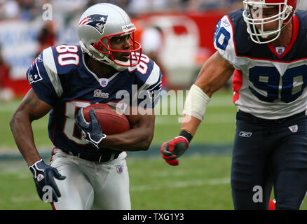 New England Patriots wide receiver Troy Brown runs past Buffalo Bills defensive end Chris Kelsay for a gain of nine yards in the third quarter at Gillette Stadium in Foxboro, Mass. on September 10, 2006. (UPI Photo/Katie McMahon) Stock Photo