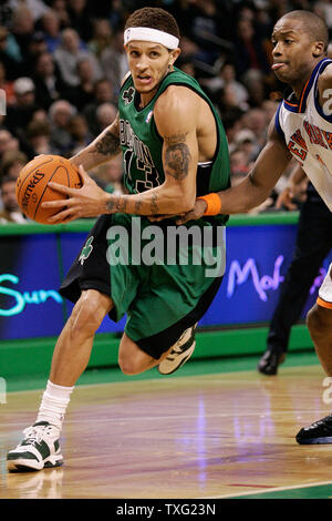 Boston Celtics guard Delonte West (13) drives to the net against New York Knicks guard Steve Francis (1)  during the second period of the game at the TD Banknorth Garden in Boston on November 24, 2006.  (UPI Photo/Matthew Healey) Stock Photo