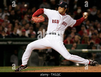 File photo taken in December 2006 shows Japanese pitcher Daisuke Matsuzaka  holding his jersey and cap during an introductory press conference with the  Red Sox in Boston. The two-time World Baseball Classic