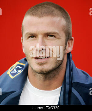 Midfielder for the Los Angeles Galaxy David Beckham sits on the bench with his teammates before the start of the game against the New England Revolution at Gillette Stadium in Foxboro, Massachusetts on August 12, 2007.  Beckham is sitting the game out because of a nagging ankle injury.  (UPI Photo/Matthew Healey) Stock Photo