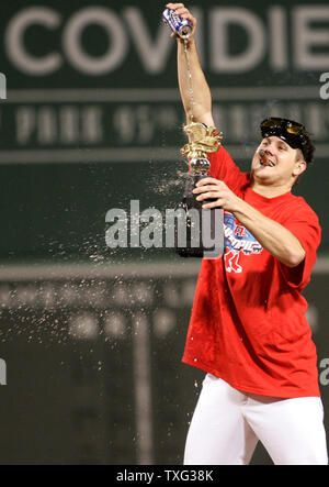 Boston Red Sox pitcher Jonathan Papelbon pours beer over the American League Championship trophy while celebrating his teams seventh game 11-2 win over the Cleveland Indians in the American League Championship Series at Fenway Park in Boston on October 20, 2007. (UPI Photo/Matthew Healey) Stock Photo