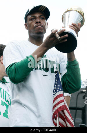 Boston Celtics player Paul Pierce holds the the Larry O'Brien Championship  Trophy during the Celtics' championship parade through downtown Boston on  June 19, 2008. The Celtics took the championship after defeating the