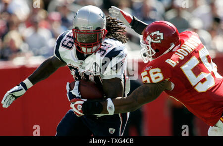 New England Patriots running back Laurence Maroney (39) charges upfield before being dragged down by Kansas City Chiefs linebacker Derrick Johnson (56)in the second half at Gillette Stadium in Foxboro, Massachusetts on September 7, 2008.  (UPI Photo/Matthew Healey) Stock Photo