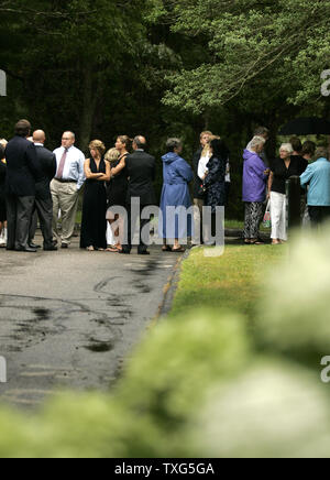 Mourners line up to pay their respects to the Shriver family at the wake of Eunice Kennedy Shriver at Our Lady of Victory church in Centerville, Massachusetts on August 13, 2009.  Eunice Shriver, who was the founder of the Special Olympics died early Tuesday in Hyannis, Massachusetts at the age of 88.     UPI/Matthew Healey Stock Photo