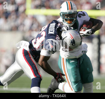 Jacksonville Jaguars quarterback David Garrard (9) runs 20 yards for a  first down in the fourth quarter as Cleveland Browns Leigh Bodden (28)  falls while missing the tackle Dec. 4, 2005 at