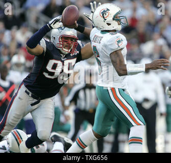 Miami Dolphins quarterback Pat White is taken off the field after a brutal  hit leaves him unconscious on the field for eight minutes. White was taken  to the hospital for further evaluations.