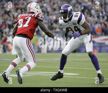 New England Patriots cornerback Kyle Arrington, rear, wraps up Denver ...