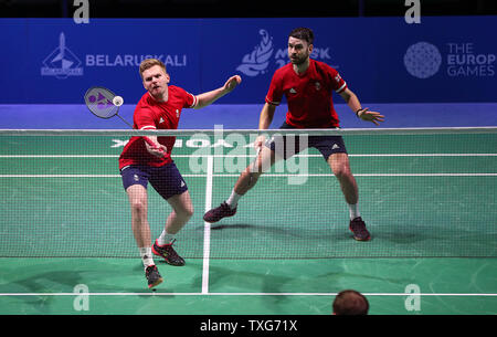 Great Britain's Marcus Ellis (left) and Chris Langridge (right) on their way to winning their Group B Mens Badminton Doubles match against Estonia's Kristjan Kaljurand and Raul Kasner, during day five of the European Games 2019 in Minsk. Stock Photo